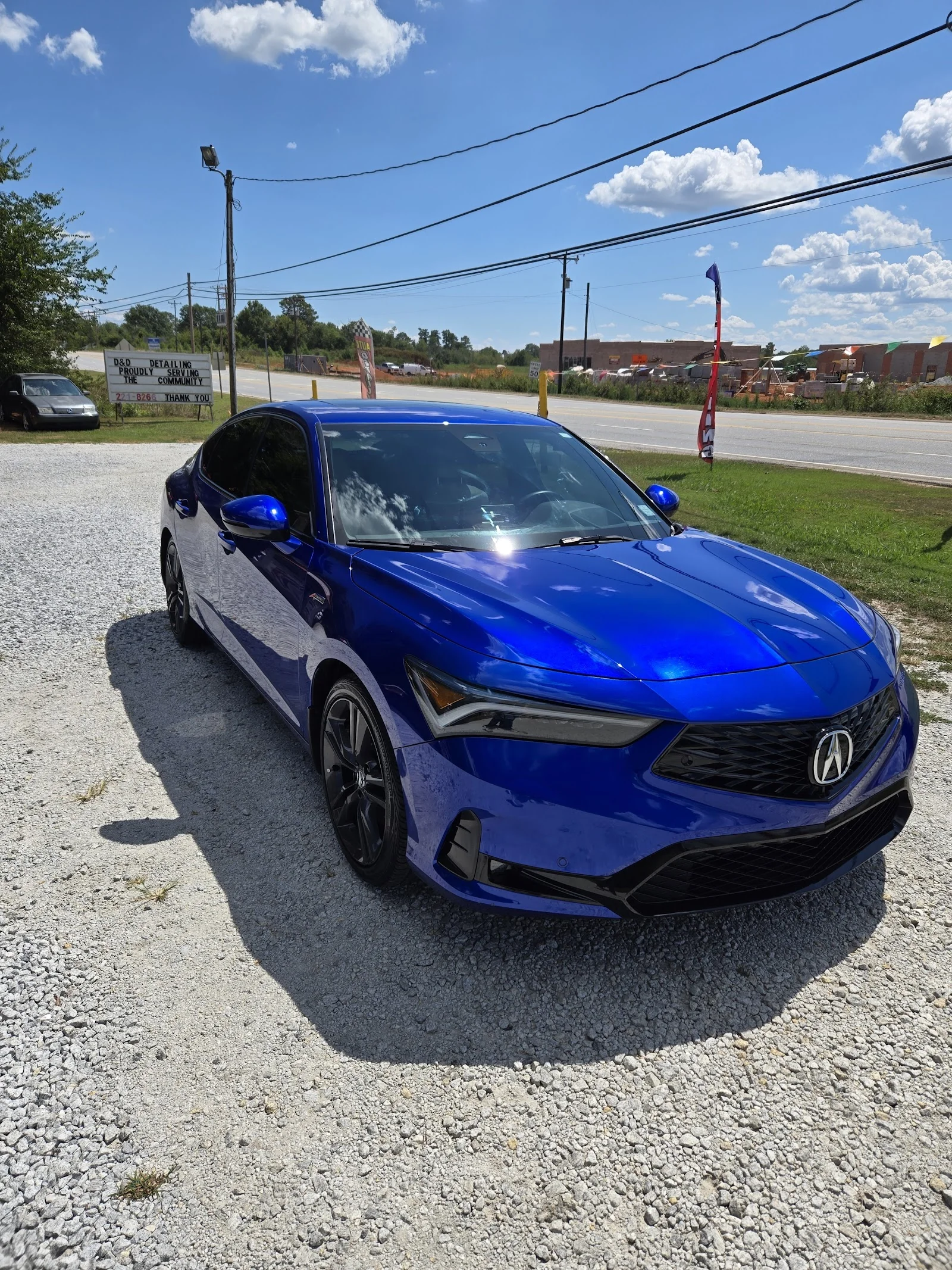 Inside D&D Detailing — shop interior and bays